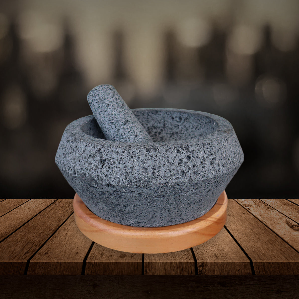 MOLCAJETE CON BISEL Y BASE DE MADERA 8 PG.